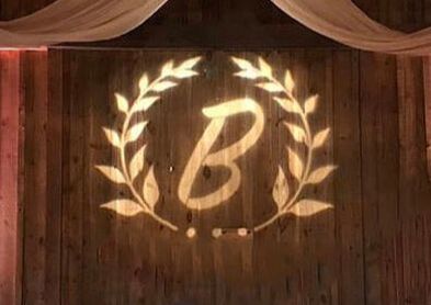 GOBO spotlight with monogram B with leaves surrounding Picture