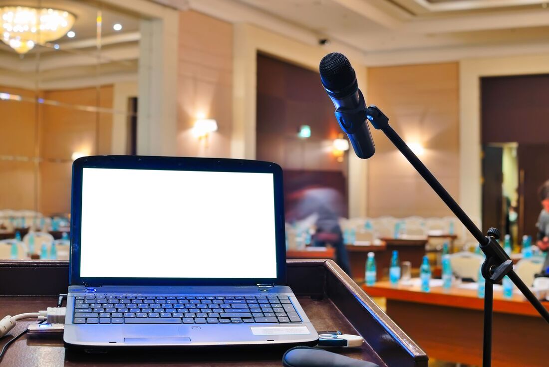 Laptop computer with microphone in a meeting room Picture