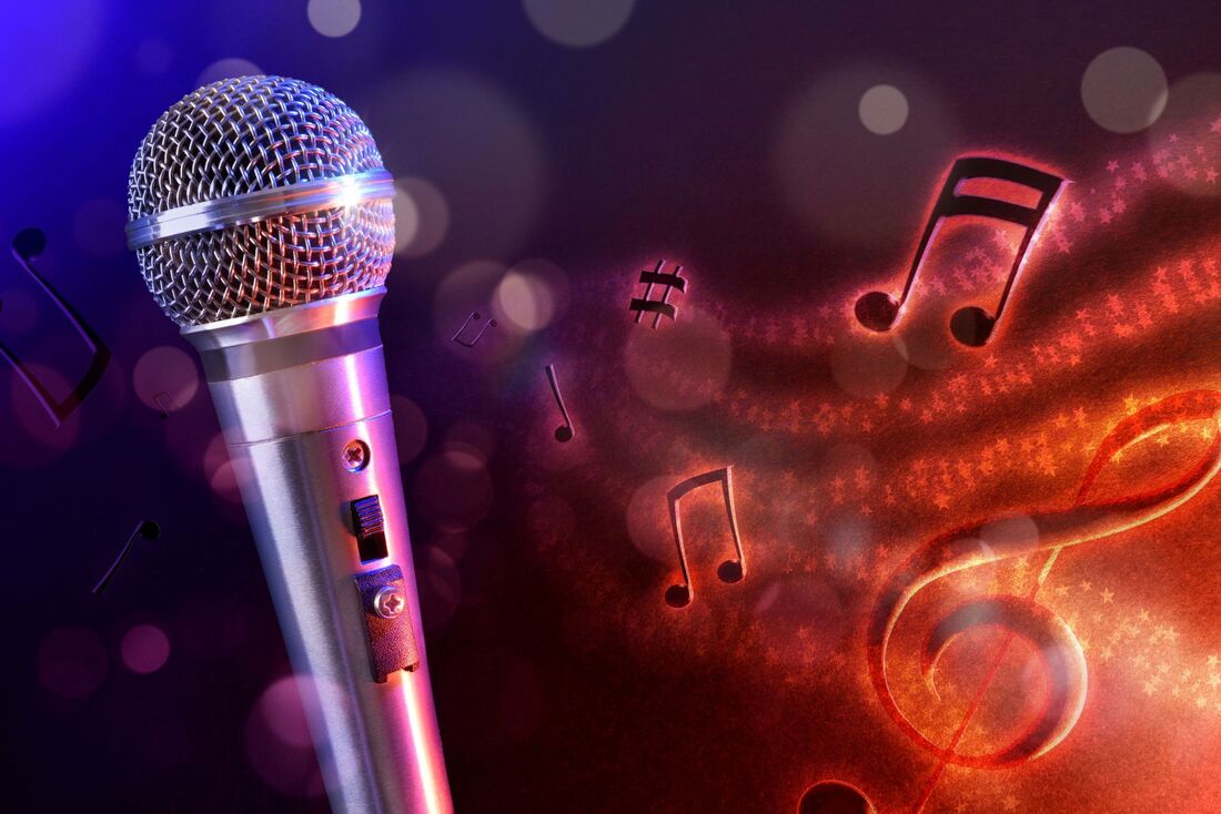 Microphone with glowing lights and floating musical notes in the background Picture