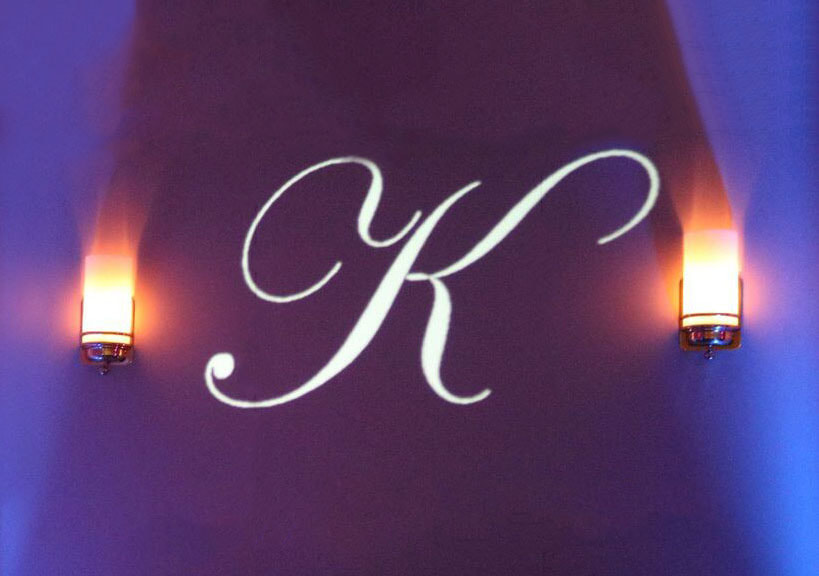 Monogram Spotlight letter K on purple wall Picture